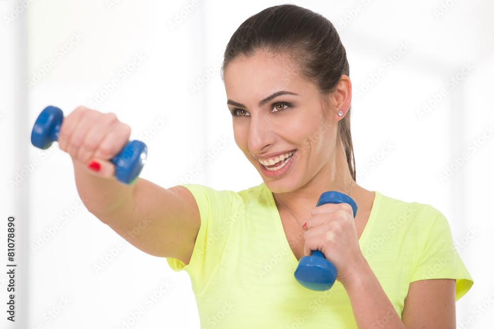Beautiful sporty woman in gym Beautiful sporty woman in gym