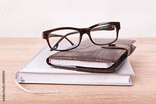Glasses and notebooks