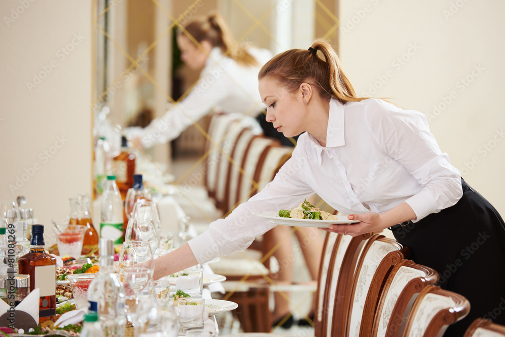 waitress at catering work in a restaurant - obrazy, fototapety, plakaty 