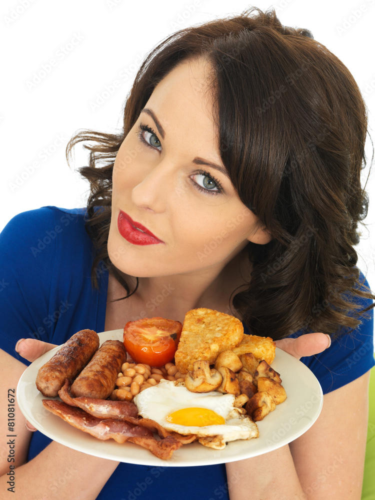 Young Woman Eating a Full English Breakfast Young Woman Eating a Full English Breakfast