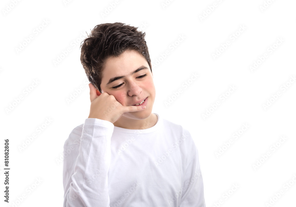 Smooth-skinned Hispanic Boy making a phone call gesture with rig Smooth-skinned Hispanic Boy making a phone call gesture with rig