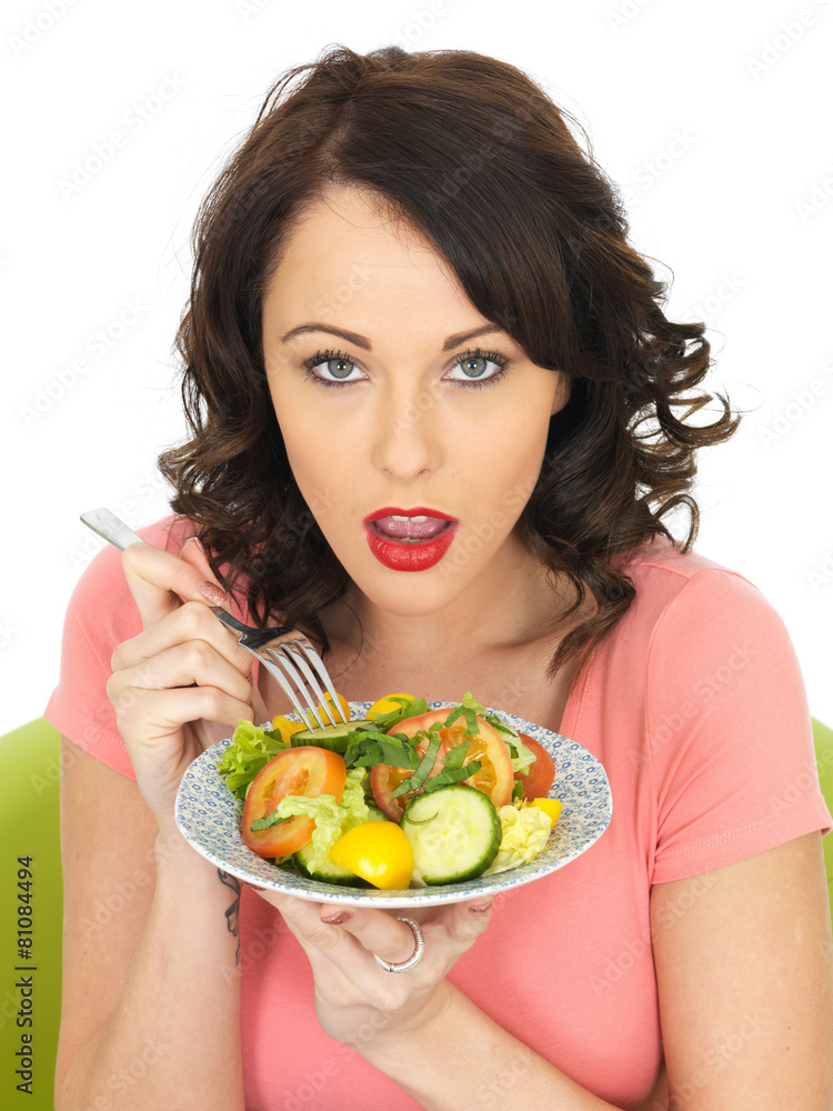 Young Woman Eating a Healthy Mixed Salad Young Woman Eating a Healthy Mixed Salad