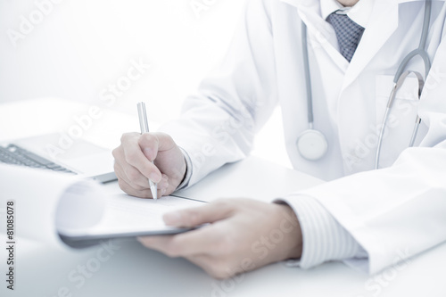 Close-up of a medical worker with laptop