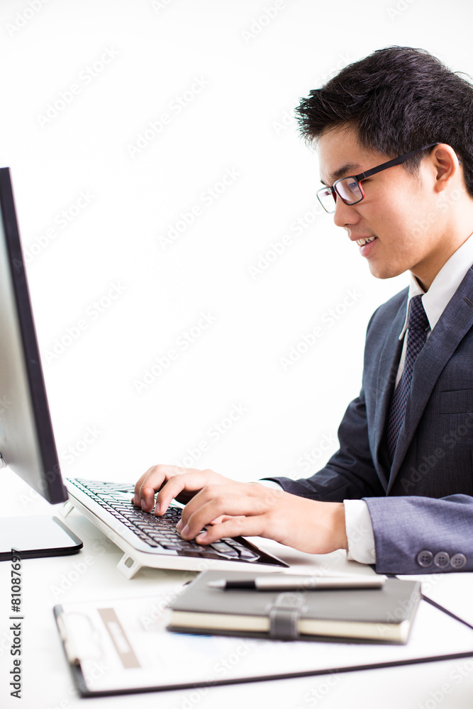 Handsome businessman working with laptop Handsome businessman working with laptop