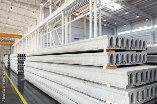 Stack of reinforced concrete slabs in a factory workshop