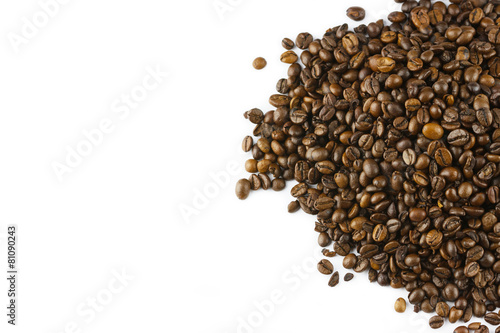Top view of roasted coffee beans isolated on white background