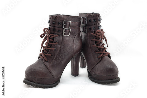 lady leather boot bown with shoelace on white background