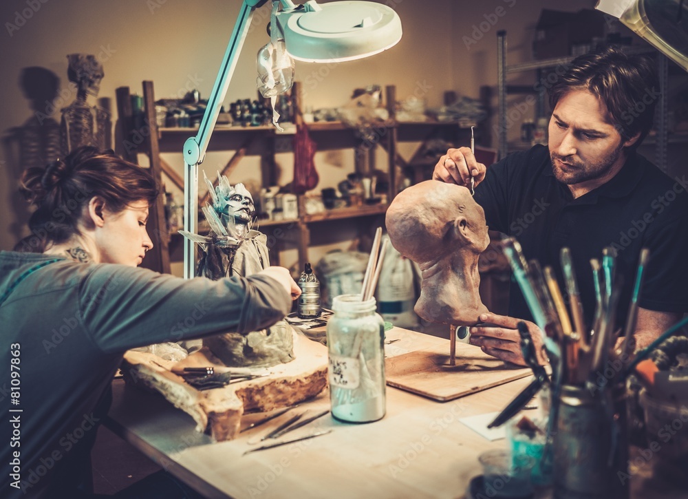 People working in a prosthetic special fx workshop - obrazy, fototapety, plakaty 