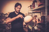 Man working in a prosthetic special fx workshop