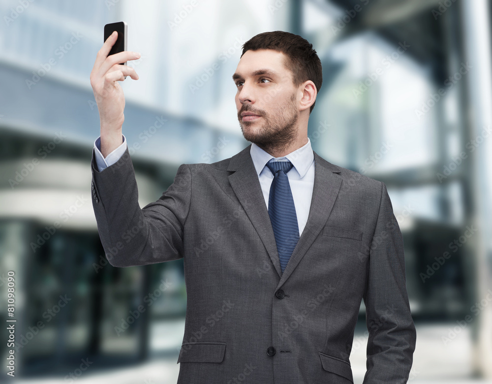 young businessman with smartphone young businessman with smartphone