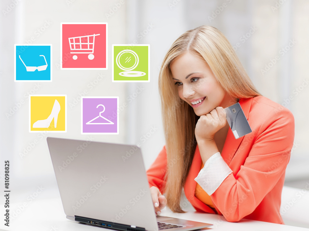 happy businesswoman with laptop and credit card happy businesswoman with laptop and credit card