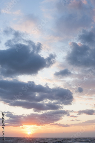 Clouds, sun and sea