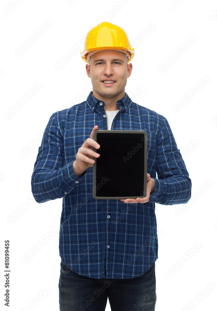smiling male builder in helmet with tablet pc smiling male builder in helmet with tablet pc