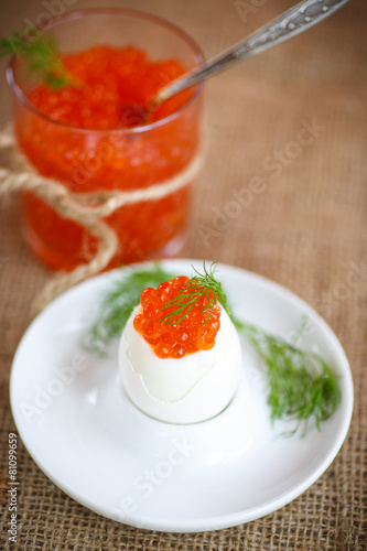 boiled egg with red caviar