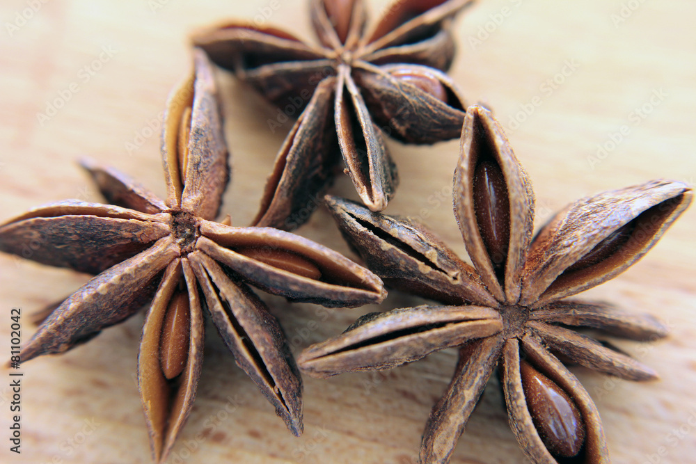 Stars anise on wood background Stars anise on wood background