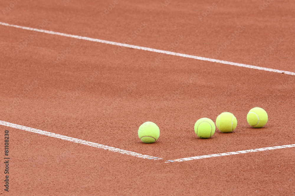 tennis balls on the court