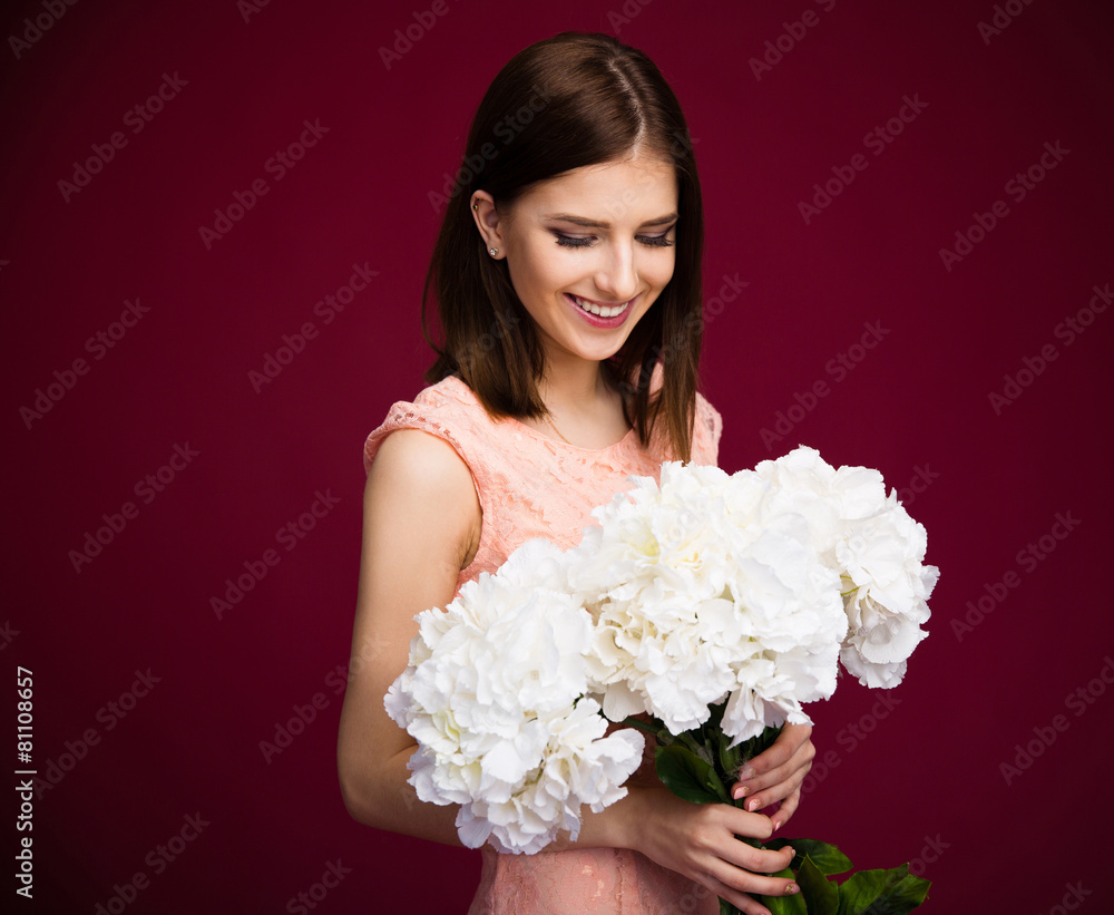 Portrait of a happy woman with flowers