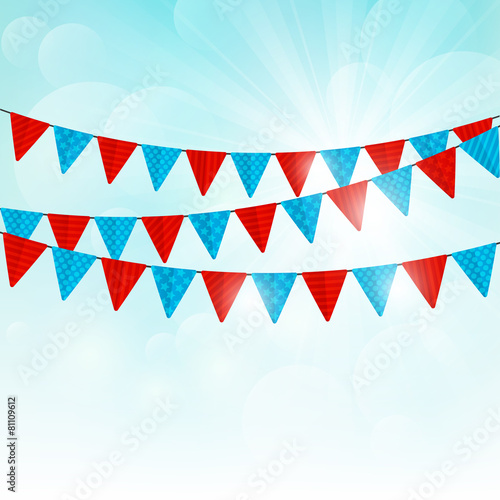 Party flags on sunny background
