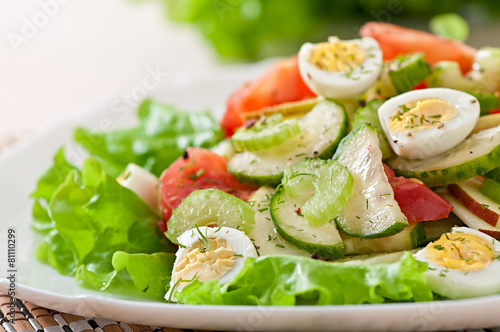 Salad of tomatoes, cucumbers and quail eggs