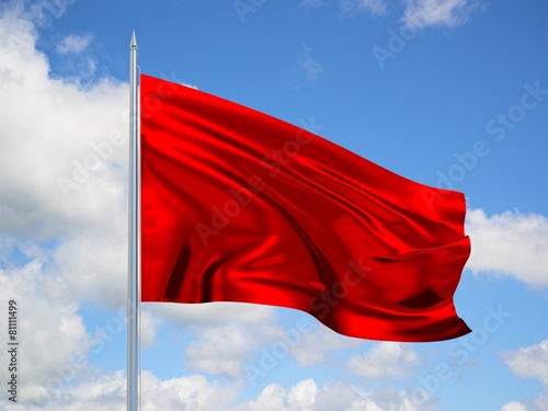RED 3d flag floating in the wind in blue sky