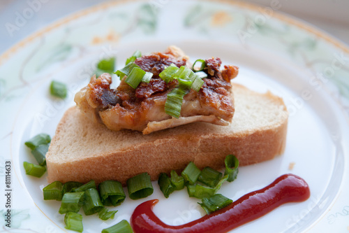 grilled meat and onions skhlekbom on a plate