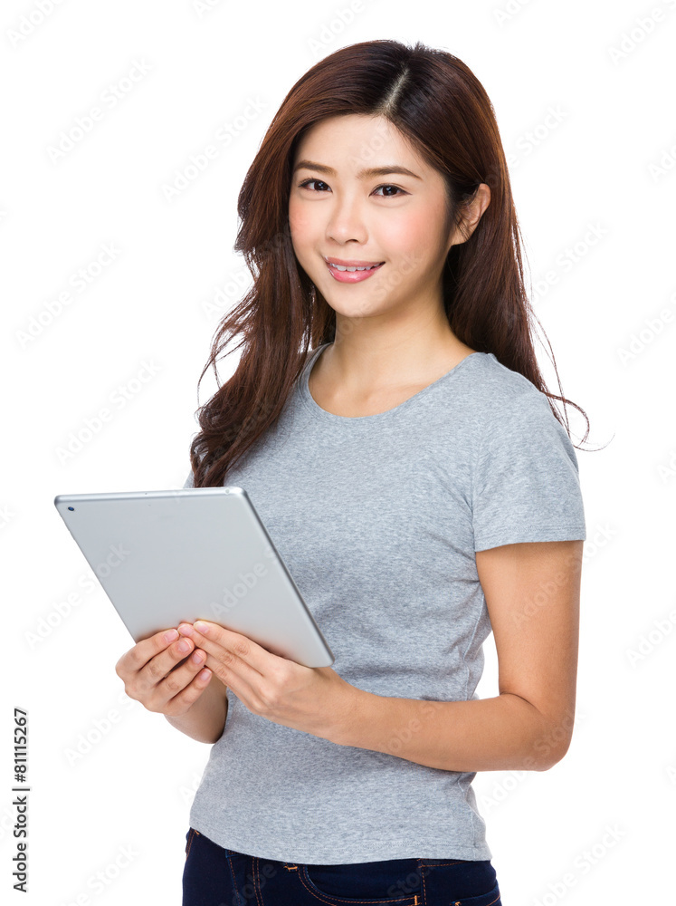 Student happy with holding a computer tablet Student happy with holding a computer tablet