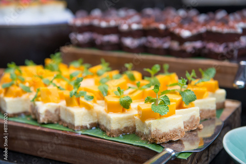 delicious cheesecake with fresh mango on top