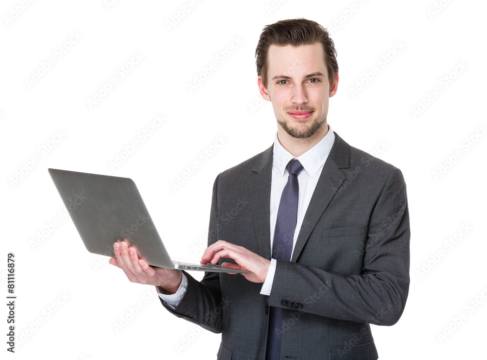 Young business man using laptop Young business man using laptop