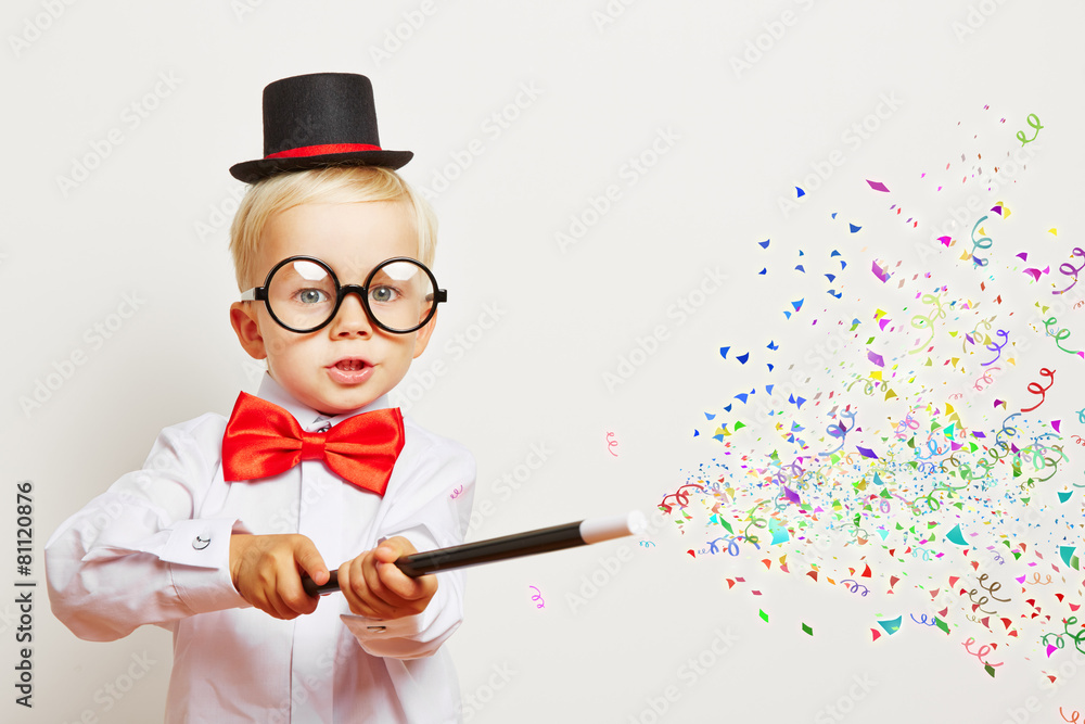  Foto zu Zauberer zaubert Konfetti aus Zauberstab Stock Photo 