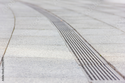 Water during a heavy rain runoff flows into