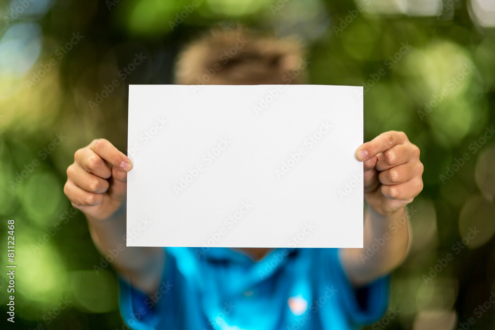 Boy with blank piece of paper Boy with blank piece of paper
