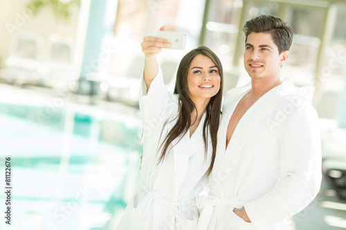 Young couple by the pool
