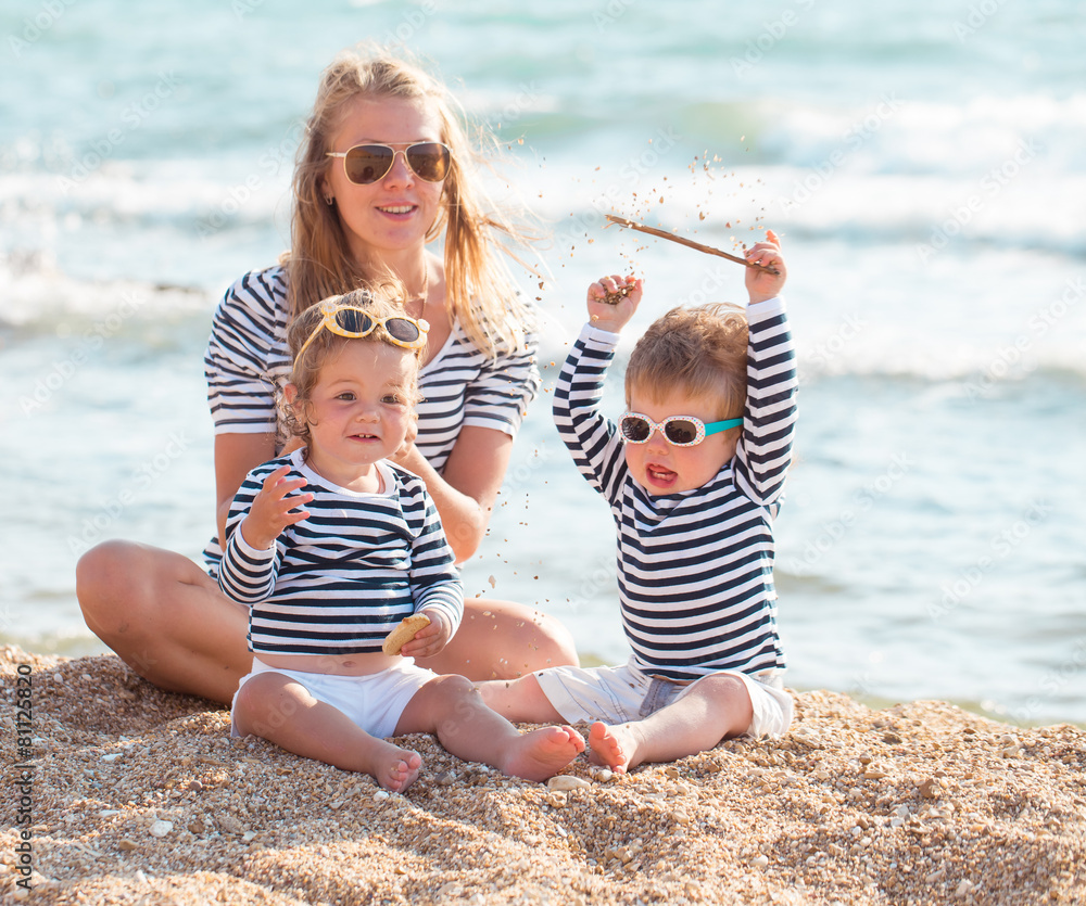 Mother with children on the beach Mother with children on the beach