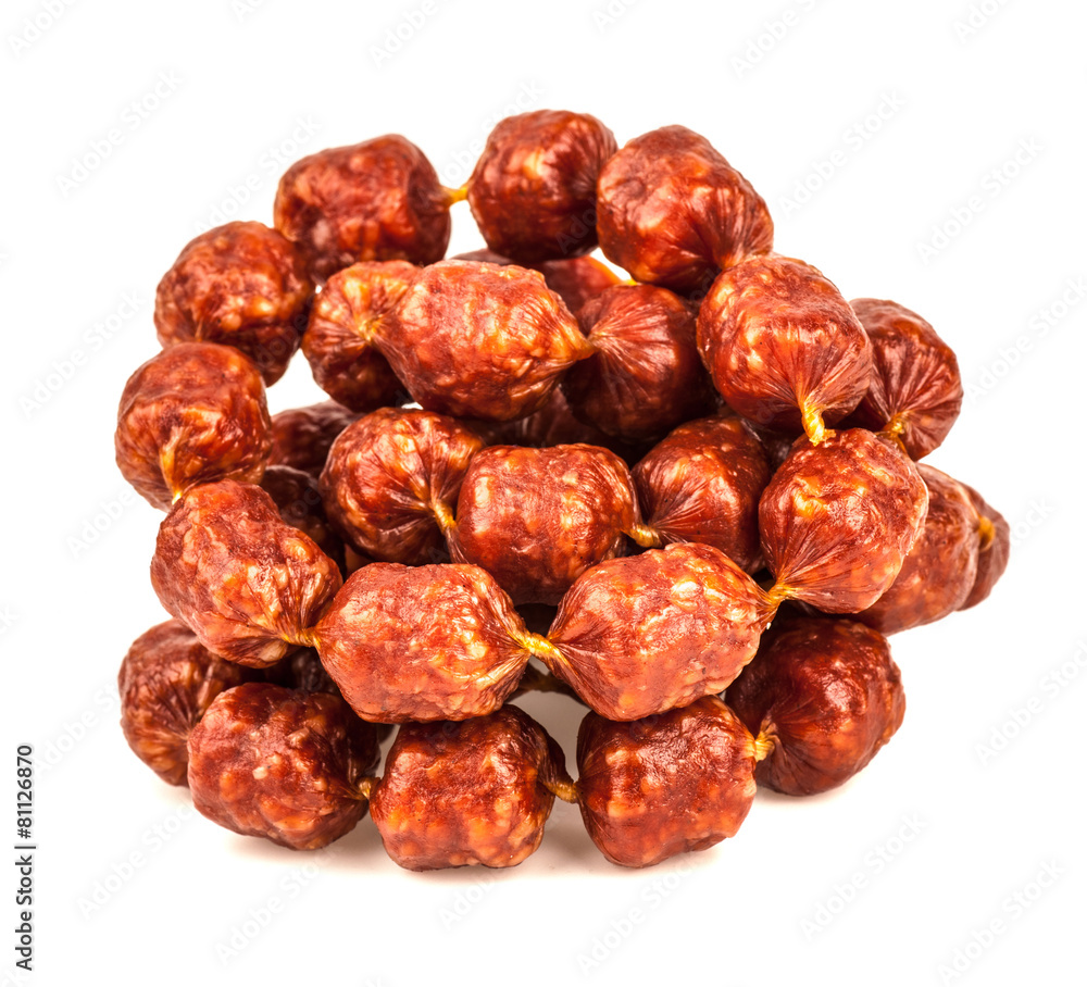 Mini sausages on white background
