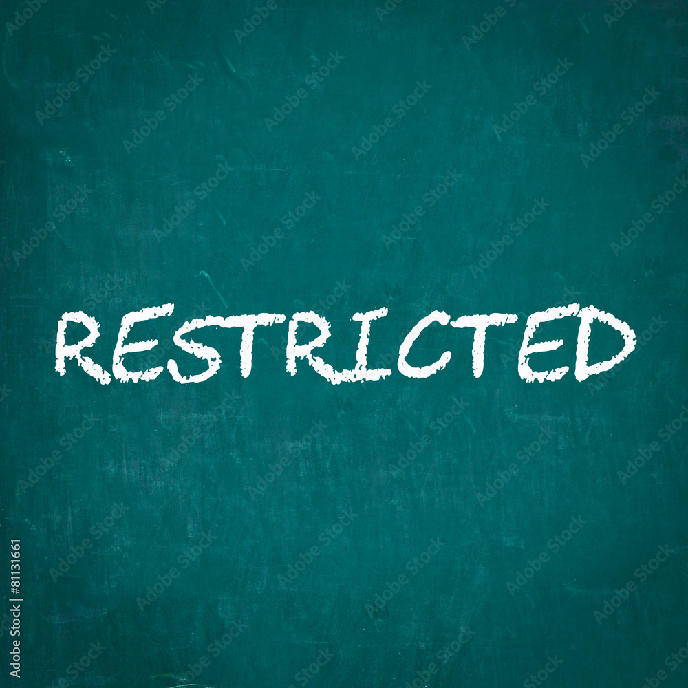 Obraz premium RESTRICTED written on chalkboard