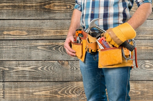 White. Worker with a tool belt. Isolated over white background. © BillionPhotos.com