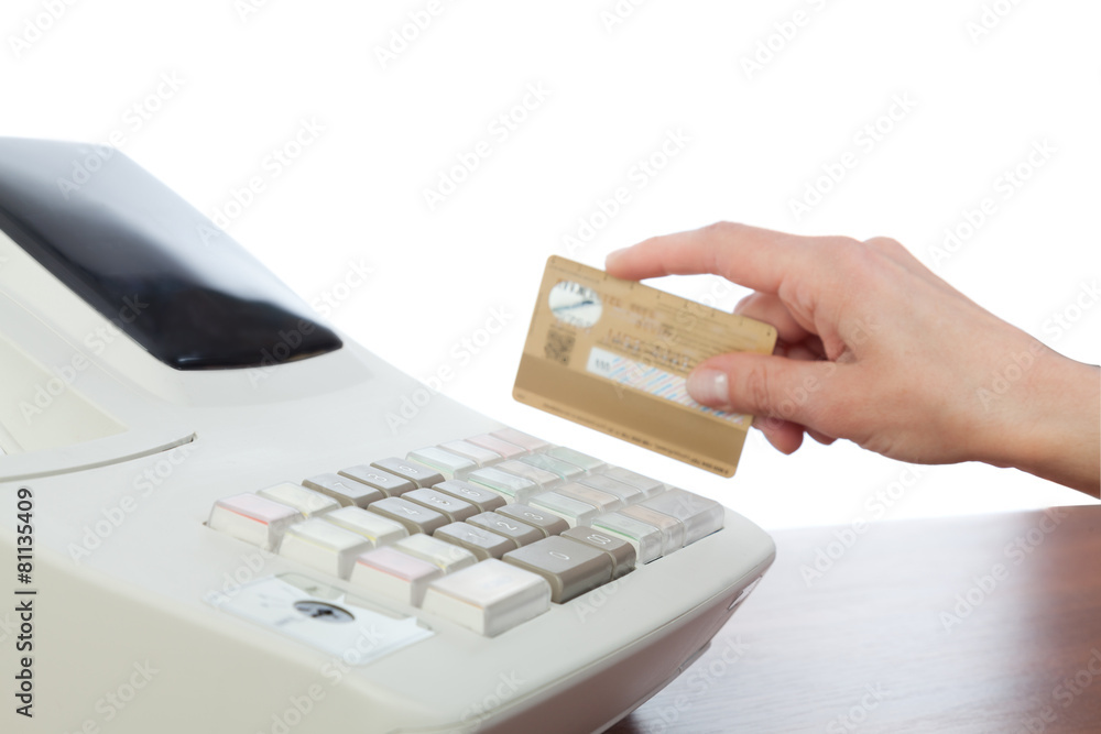 Cashier Holding Credit Card in Cash Register Cashier Holding Credit Card in Cash Register