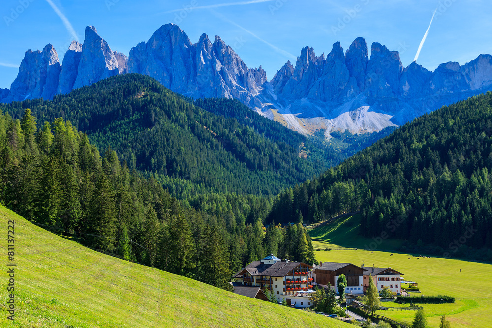 View of mountain valley and Santa Maddalena village, Dolomites