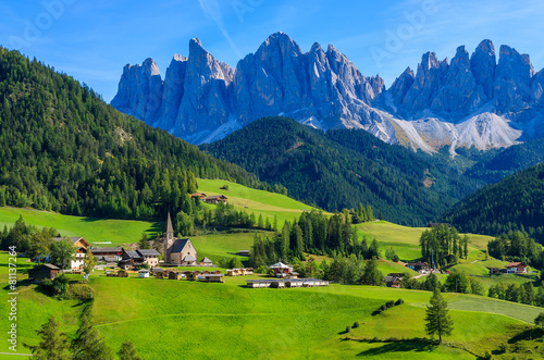 View of mountain valley and Santa Maddalena village, Dolomites photo