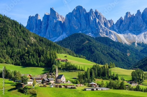 View of mountain valley and Santa Maddalena village, Dolomites photo
