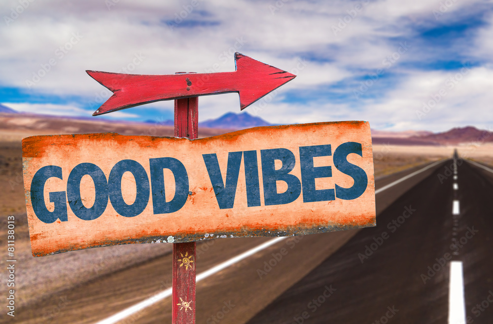 Fototapeta premium Good Vibes sign with road background