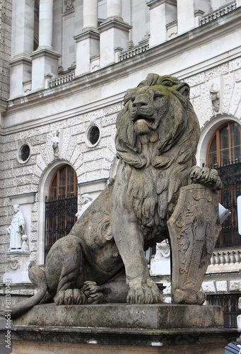 Lion statue with shield in Vienna Hofburg, Austria