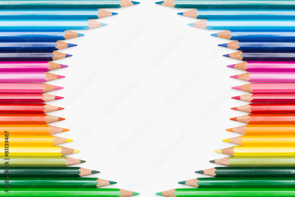 Fototapeta premium Colored pencils lined up in circular frame