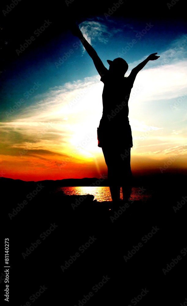 woman and sunset - Stock Image