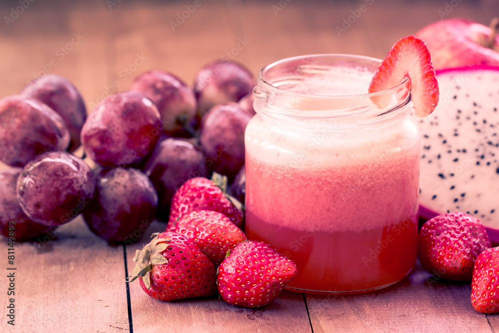 Strawberry juice blend with mix fruit in sweet color Strawberry juice blend with mix fruit in sweet color