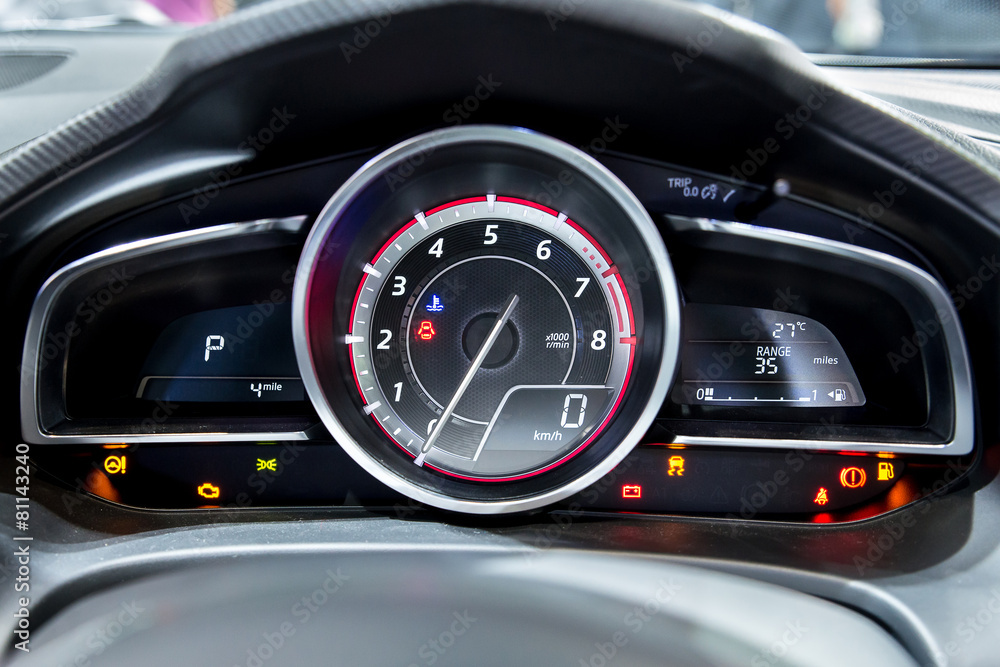 Close up shot of modern speedometer in a car.