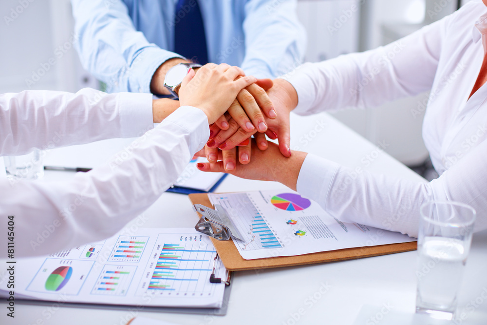 Business team are showing unity with their hands Business team are showing unity with their hands