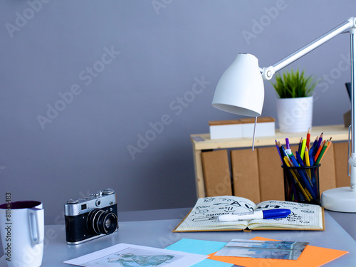 Designer's table with notes and tools © lenetsnikolai