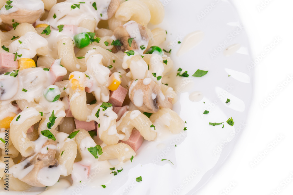 Pasta cavatappi with vegetables and sausage.