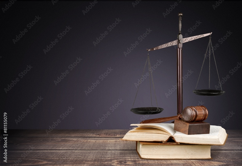Law. Golden scales of justice, gavel and books isolated on white Law. Golden scales of justice, gavel and books isolated on white